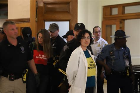 Climate protestors arrested at State House after hours-long sit-in